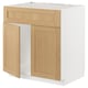 Schrank aus Eichenfurnier mit abgeschrägten Kanten, schwenkbaren Türen, klassischem Design.
