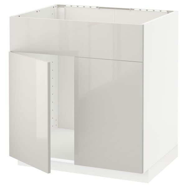 Ein weißer METOD-Küchenschrank mit glänzender Oberfläche. Der Schrank ist rechteckig und für eine moderne Küche konzipiert, mit klaren Linien und einem minimalistischen Look.