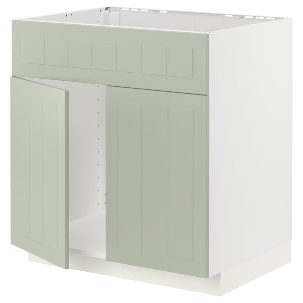 Ein hellgrüner METOD-Küchenschrank mit klassischem Design, zwei Türen und einem stabilen Rahmen, perfekt für einen harmonischen Küchenlook.