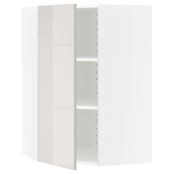 Ein weißer METOD Küchenschrank mit modernem, schlankem Design. Der Schrank hat eine hochglänzende graue Tür und ist innen verstellbar.