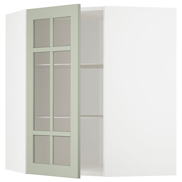 Ein grüner IKEA METOD Küchenschrank mit verstellbaren Regalen und einer Glastür in einem Gittermuster.