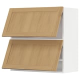 Ein Set aus zwei hellbraunen Küchen-Wandschränken aus Holz.