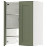 Grüner Küchenschrank mit einer offenen Tür mit verstellbaren Regalen. Modernes, zeitloses Design.
