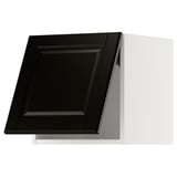 Schwarzer Küchenschrank mit abgeschrägten Kanten und schlankem Design.