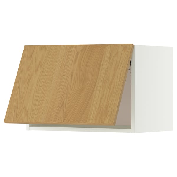 Dieses Bild zeigt eine Schranktür aus Holz aus der IKEAS METOD Serie. Die Tür ist hellbraun mit einem schlichten rechteckigen Design.