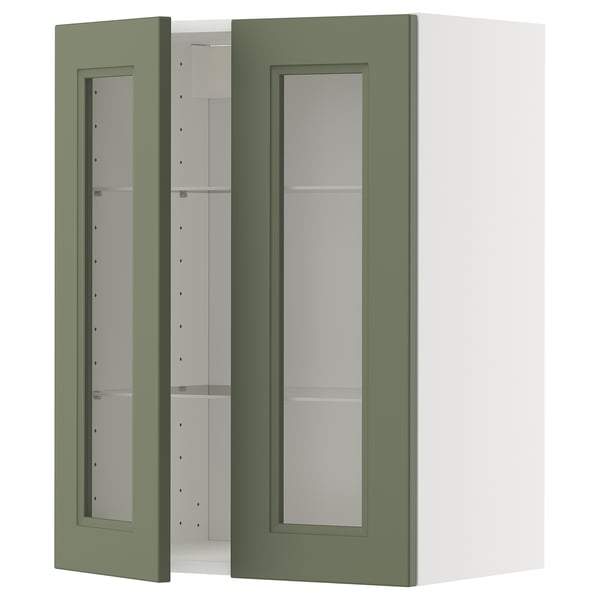 Grüner Küchenschrank mit Glastür und Regalen.