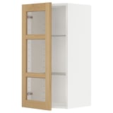 Weißer Holzschrank mit Glasböden, Eichenholzverkleidung, linke Seite offen.