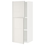Weißer hochglänzender ikea METOD Küchenschrank mit verstellbarem Regal und umkehrbarer Tür.
