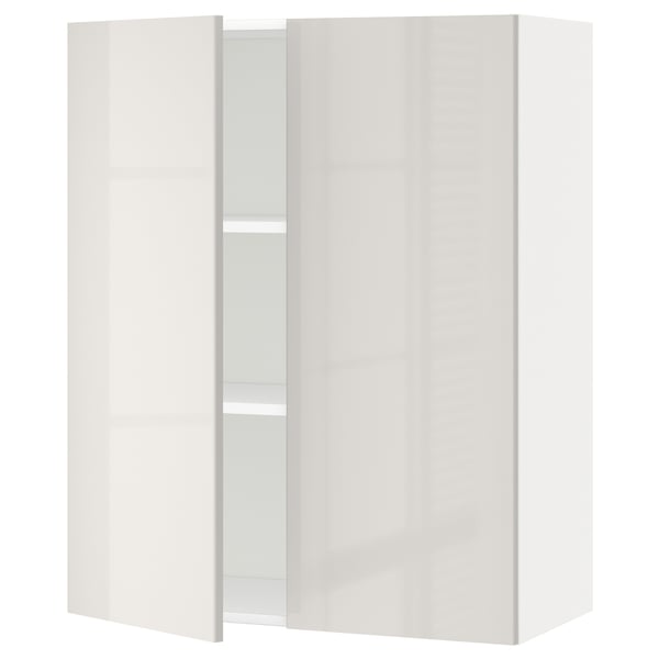 Ein weißer METOD-Küchenschrank mit modernem Design, glatter Hochglanzoberfläche und verstellbaren Regalen.