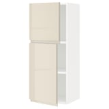 Ein moderner METOD Wandschrank in Hochglanzbeige mit integrierten Griffen.