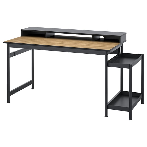 Ein MULLSJÖ Schreibtisch in Schwarz und Holz mit Metallrahmen, oberem Regal und ausziehbarer Schublade.
