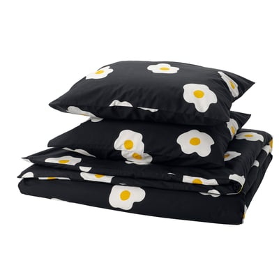 ÖGONLOCKSMAL Bettwäsche-Set: schwarz mit gelbem Blumenprint, Baumwolle/Viskose, gefaltet.