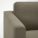 Nahaufnahme der Armlehnen moderner Sofas mit schlankem Design und hochwertigem Stoff.