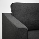 Dunkelgraues Sofa, schlankes und modernes Design, weiche Kissen, hochwertige Polsterung, einladender Komfort.