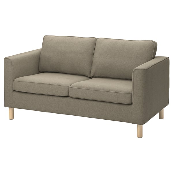 Kleines beiges Sofa mit gemustertem Stoff und Holzbeinen, modernes Design, gemütlich und elegant.