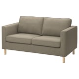 Kleines beiges Sofa mit gemustertem Stoff und Holzbeinen, modernes Design, gemütlich und elegant.