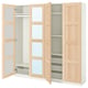 Ein offener IKEA PAX-Kleiderschrank aus Holz mit Glastüren, Regalen und einer Kleiderstange im Inneren.