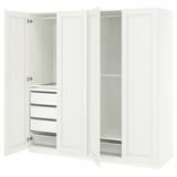 Weißer Ikea PAX Kleiderschrank, offen. Schubladen, Regale, Netzkorb.