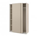 Ein beiger Ikea PAX-Kleiderschrank mit Schiebetüren und Innenregalen.