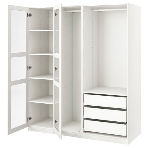Ein ikea PAX-Kleiderschrank in Weiß mit offenen Türen, die leere Regale und Schubladen freigeben, der für die individuelle Aufbewahrung konzipiert ist.