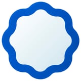 Runder blauer Spiegel mit gewellten Kanten, Glasmitte, dekoratives Wanddekor.