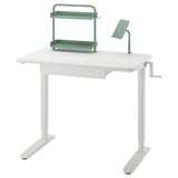 Verstellbarer weißer Kinderschreibtisch mit grünem Organizer und Handyhalter.