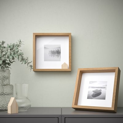 Zwei Wandfotos: Kunst & Strand, Pflanze in der Nähe.