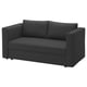 Schwarzes SKÖNABÄCK Schlafsofa. Modernes, kastenförmiges Design mit dunkler Polsterung, klaren Linien und verdecktem Stauraum.