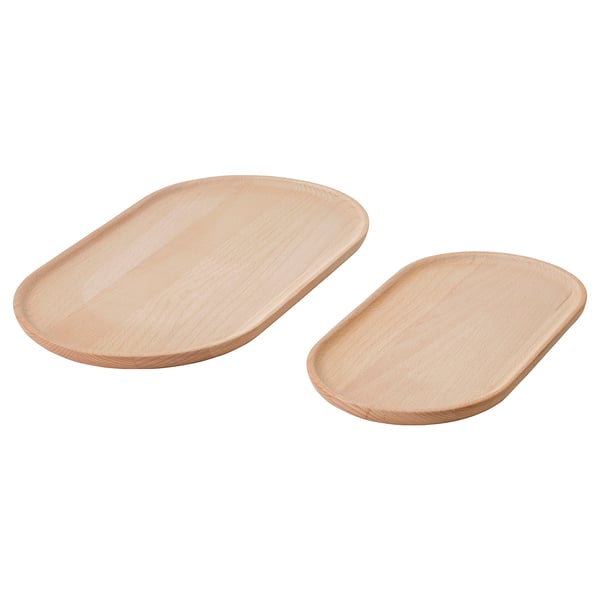 Zwei Holztabletts, hellbraun, ovale Form, glatte Oberfläche.