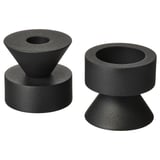 Zwei schwarze, wendbare Kerzenständer aus stabilem Metall, eine Seite für hohe Kerzen, die andere für Teelichter.