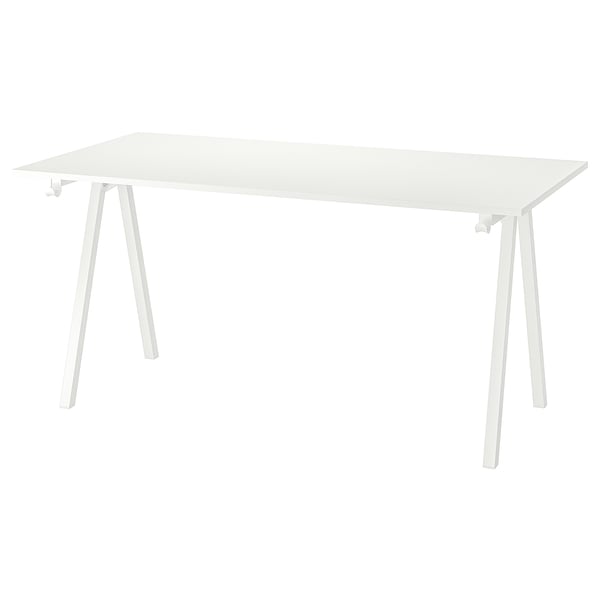 Ein Trotton-Tisch mit weißer Platte und Beinen. Es hat eine rechteckige Form und ein einfaches, modernes Design.