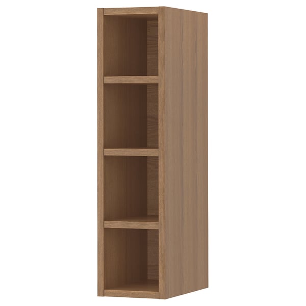 Ein hellbraunes Holzregal von VADHOLMA mit drei offenen Regalen aus Eschenfurnier und Spanplatten, das für die Aufbewahrung in der Küche konzipiert ist.