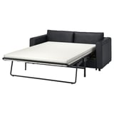 Dieses Bild zeigt ein schwarzes Schlafsofa von VIMLE, schlank und modern, das mit einem leicht zu reinigenden, wandelbaren Design auf Komfort ausgelegt ist.