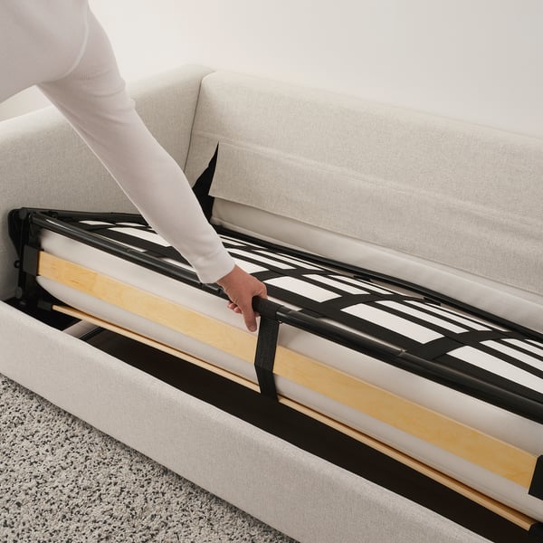 Anpassen der Stützlatten des VIMLE Schlafsofas für ein bequemes Bett.