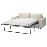 Ein hellbeiges Schlafsofa aus VIMLE Stoff mit Metallrahmen, das auf Komfort und Funktionalität ausgelegt ist. Es ist ein schlankes, modernes Design.