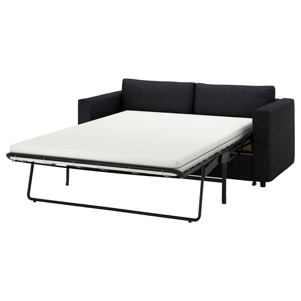 Das Schlafsofa VIMLE in Dunkelgrau bietet ein modernes, vielseitiges Design mit einem weichen, wandelbaren Sitzgefühl.