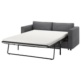 Graues VIMLE Schlafsofa, halboffen mit weißer Matratze, Metallrahmen, neutrales Design.