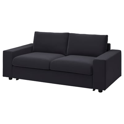 Modernes schwarzes Schlafsofa, minimalistisches Design, Samtstoff, bequeme Kissen.