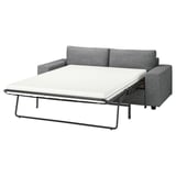 Ein graues VIMLE-Schlafsofa, das sich leicht in ein bequemes Bett verwandeln lässt.