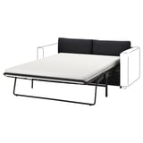 Ein schwarzes VIMLE Schlafsofa mit weißer Matratze, das von einem Metallgestell getragen wird.
