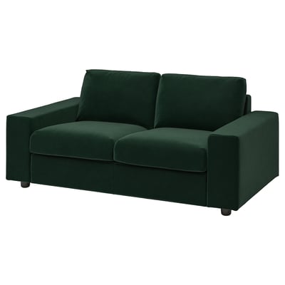 Dunkelgrünes VIMLE Sofa mit modernem Design, Polyesterkissen, Holz- und Metallrahmen.