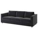 Ein modernes, dunkelgraues VIMLE-Sofa mit schlankem Design, Plüschkissen und Schlafsofa-Mechanismus.