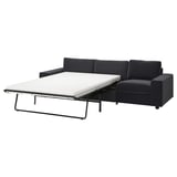 Ein schwarzes VIMLE Schlafsofa mit schlankem, modernem Design und einem umwandelbaren Bereich zum Schlafen.
