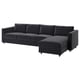 Ein graues Sektionssofa VIMLE mit Chaiselongue in modernem Design und dunklem Stoff.
