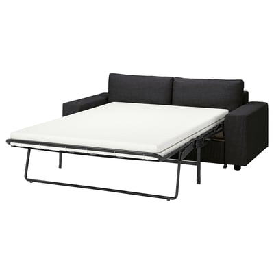 VIMLE schlankes schwarzes Schlafsofa offen mit weißem Kissen, modernes Design.