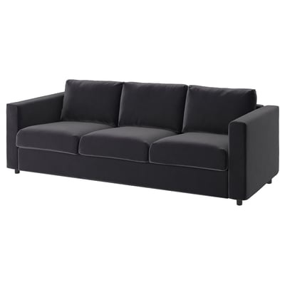 Ein modernes dunkelgraues VIMLE-Sofa mit klaren Linien und weichen Kissen.