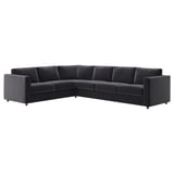 Modernes dunkelgraues L-förmiges Samtsofa, schlankes und minimalistisches Design.