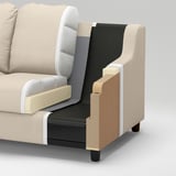 Ein Sektionssofa mit Schnittschichten: Schaumstoff, Spanplatten, Stahl, Stoff und Polyester. Rahmenteile sind ebenfalls sichtbar.