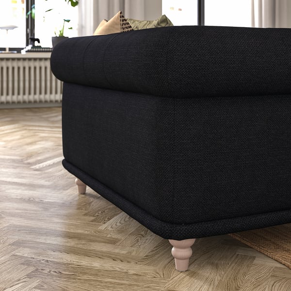 Dunkelgraues VISKAFORS Sofa, klassisches Design. Weiche, abgerundete Kanten und einladende Sitzfläche.