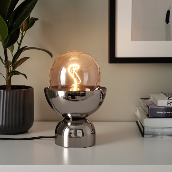 Modern bowl lamp with led bulb displays warm light, enhancing room ambiance.